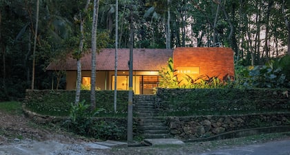 Charming 2-BR farmhouse with AC, WiFi in Thiruvananthapuram.
One with Nature