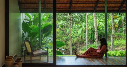 Charming 2-BR farmhouse with AC, WiFi in Thiruvananthapuram.
One with Nature