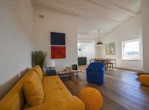 Apartment (One Bedroom Apartment) | Living room | 32-inch flat-screen TV with satellite channels