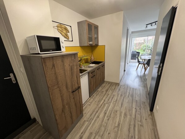 Fridge, microwave, coffee/tea maker, electric kettle