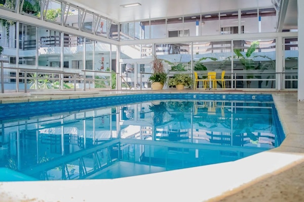 Indoor pool, open 7:00 AM to midnight, pool loungers
