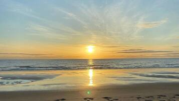 On the beach, white sand