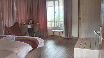 Desk, laptop workspace, free WiFi, bed sheets