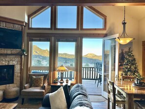 TV, fireplace, books - Mountain Retreat: Private Hot Tub & Scenic Views (Estes Park)