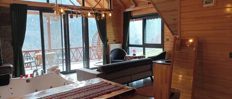 Deluxe Bungalow, Balcony, Mountain View | Living area
