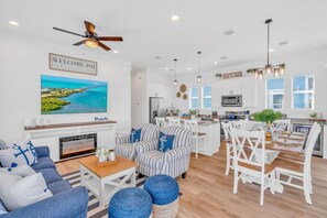 Smart TV, chimenea, mesa de ping pong, estéreo