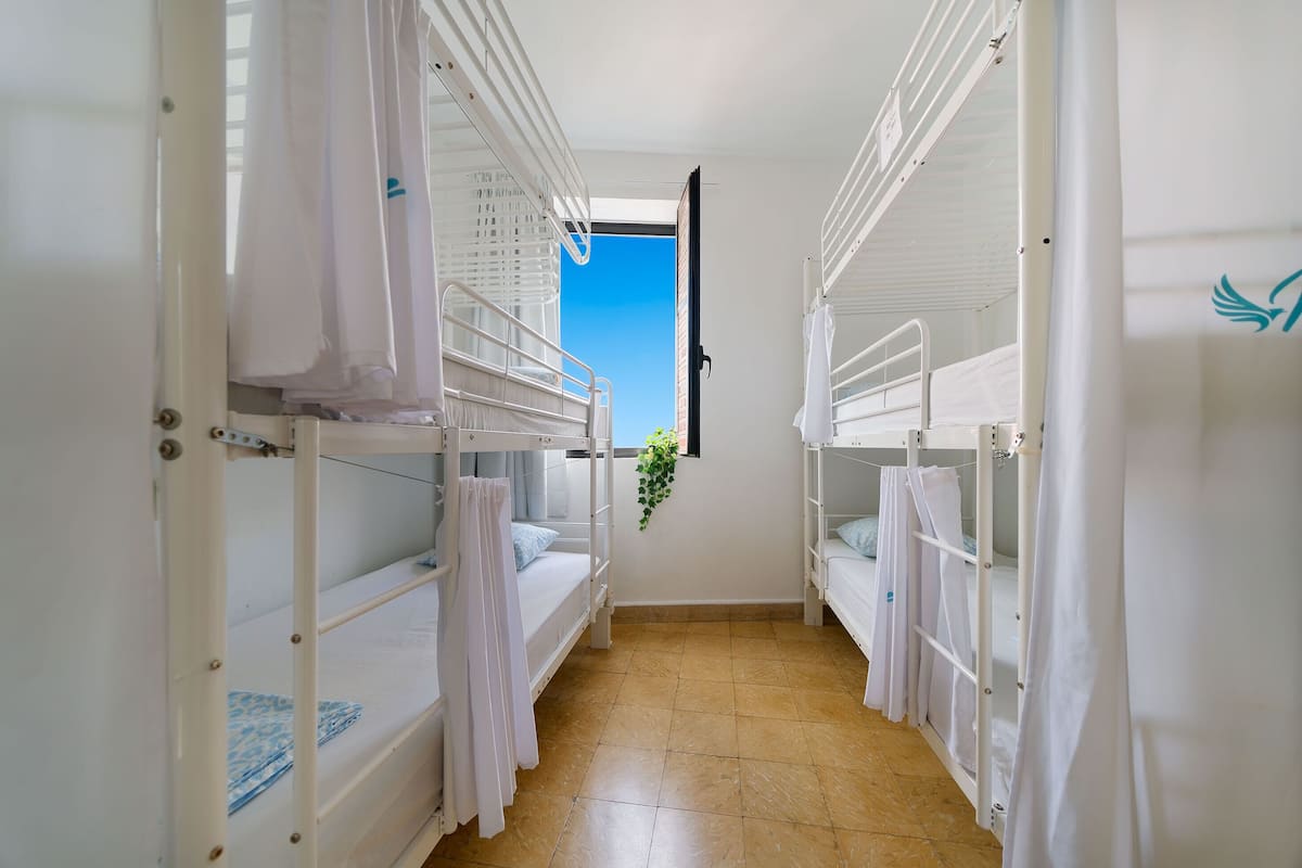 Dormitorio compartido superior, vistas a la ciudad | Wifi gratis