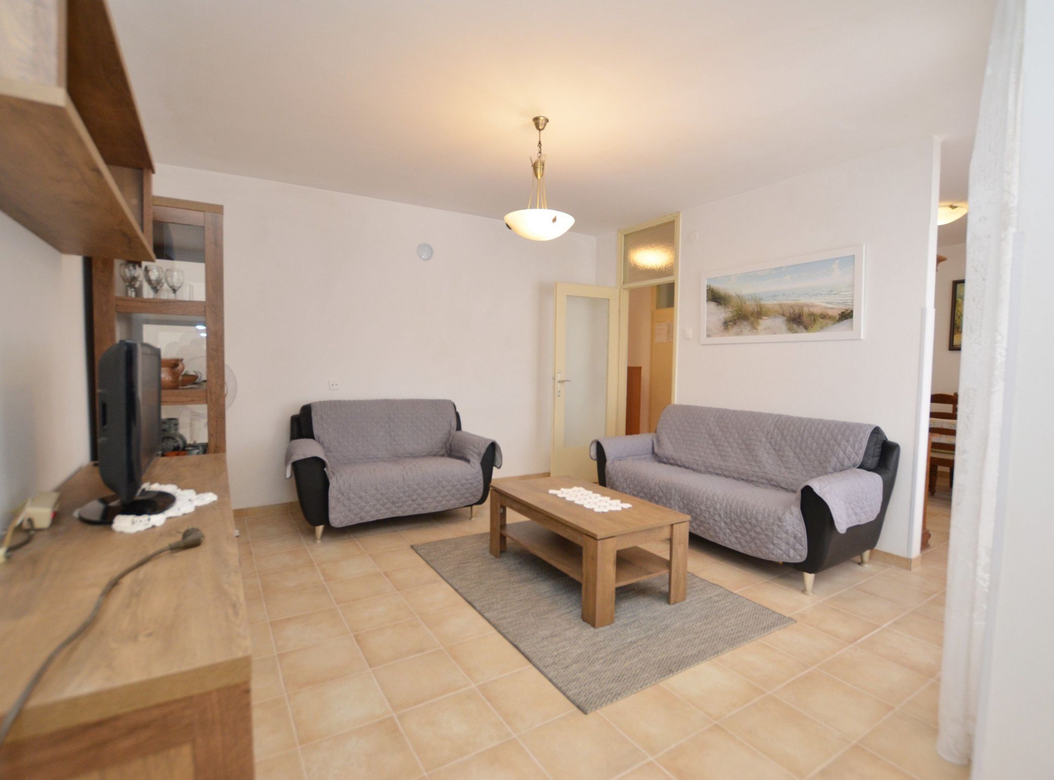 Apartment (Two Bedroom Apartment with Loggia) | Living room | 32-inch flat-screen TV with satellite channels