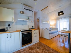 Apartment (One Bedroom Apartment with Balcony) | Private kitchen | Fridge