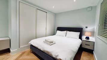 Apartament | 1 dormitori, planxa i posts de planxar, wifi gratuïta i roba de llit