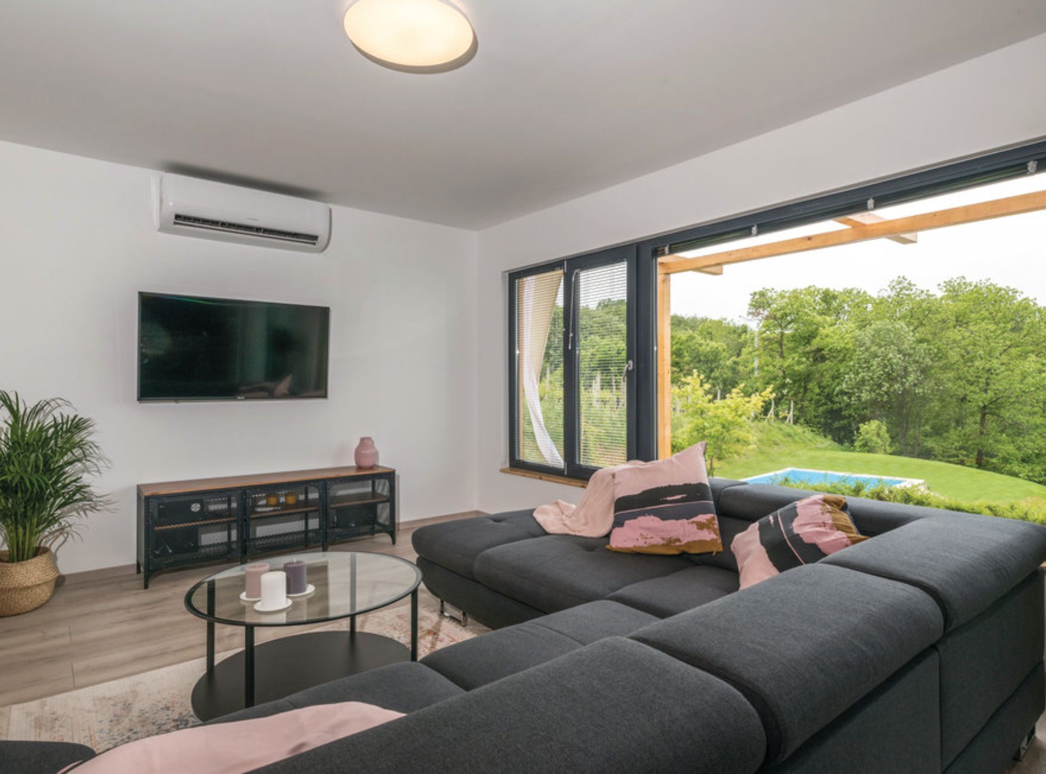 House (Three Bedroom Holiday Home with Pool) | Living room | 32-inch flat-screen TV with digital channels