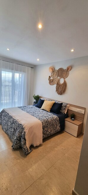 2 dormitorios, tabla de planchar con plancha, wifi y ropa de cama