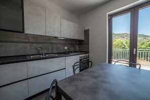 Apartment, Balcony | Private kitchen - Casa Vacanze Signora Cinzia (Torchiara)