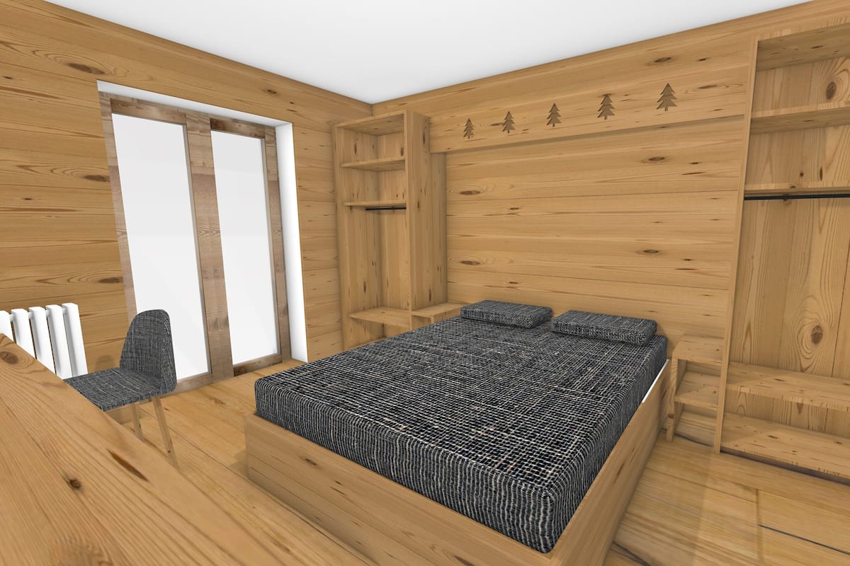 A wooden room with a bed, a chair, and a radiator.