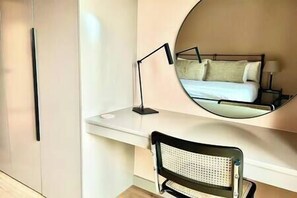 1 bedroom, desk, iron/ironing board, travel crib