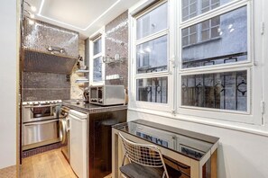 Fridge, microwave, coffee/tea maker, toaster