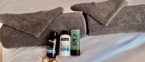 Jetted bath, hair dryer, towels, soap