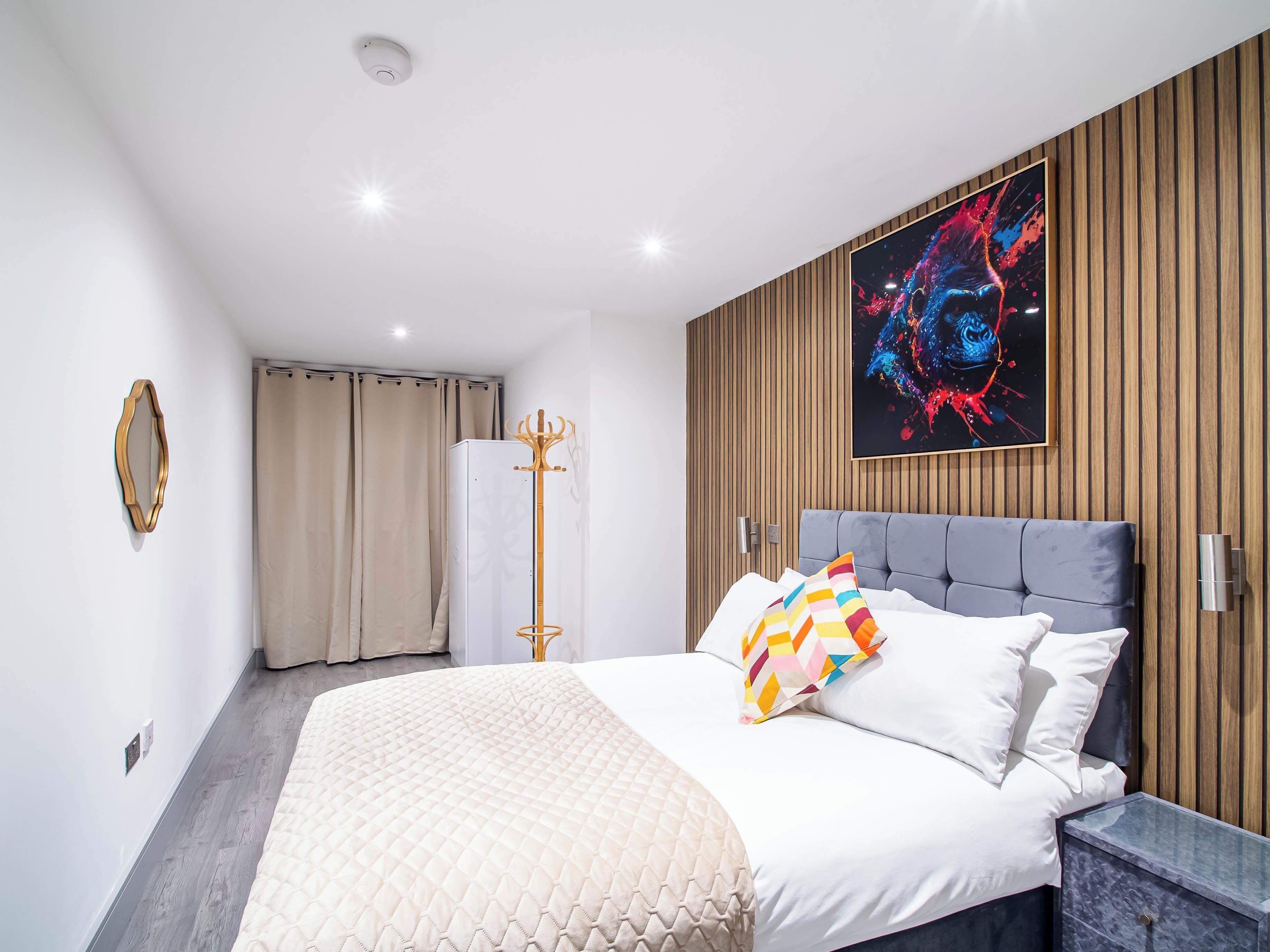 Departamento | 1 habitación, tabla de planchar con plancha, wifi gratis y ropa de cama 