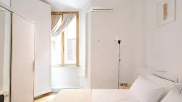 2 dormitorios, tabla de planchar con plancha, wifi gratis y ropa de cama