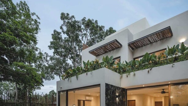 A modern house with a pool, large windows, and a garden. - Maki Mystical Tulum Villa Beach Club Access (Tulum)