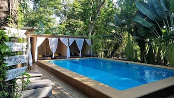 Outdoor pool, open 7:00 AM to 9:30 PM, free pool cabanas, pool loungers
