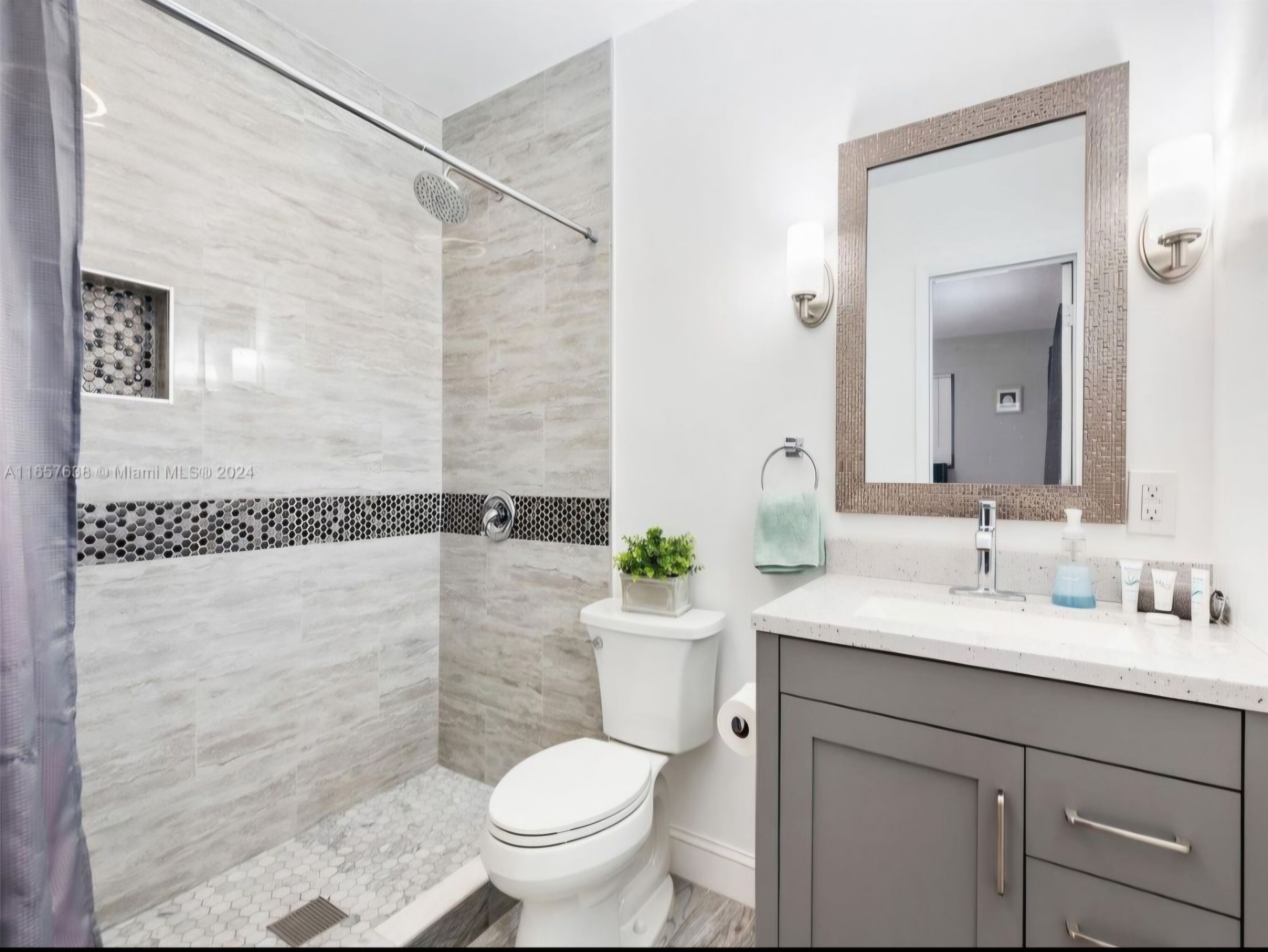 Shower, towels, soap, toilet paper