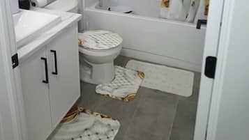 Jetted tub, hair dryer, towels, soap