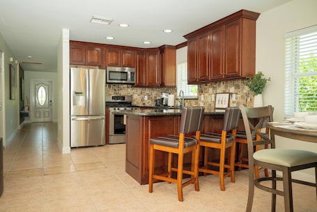 Microwave, oven, stovetop, dishwasher. The Orchid House - charming 3 bed/2 bath home in the heart of Naples