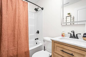 Hair dryer, towels, soap, toilet paper