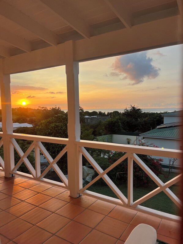 Terrace/patio - Sea View Terrace, enjoy a short walk to the beach & beautiful evening sunsets. (St Mary)