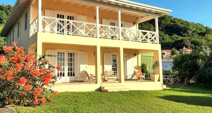 Sea View Terrace, enjoy a short walk to the beach & beautiful evening sunsets.