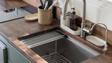 Fridge, microwave, stovetop, coffee/tea maker