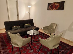 Living area - SeeVital vacation apartment - 4 minutes to Lake Constance. Quiet location with terrace. (Langenargen)