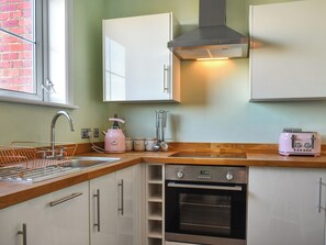 Dishwasher, high chair, cookware/dishes/utensils