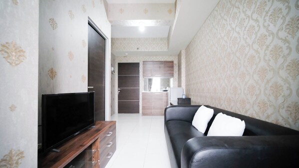 Deluxe Apartment | Living area - Tidy And Comfy 1Br At Tamansari Prospero Sidoarjo Apartment (Sidoarjo)