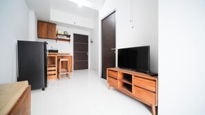 Apartamento Deluxe | Zona de estar