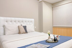 Deluxe Studio | Desk - Warm And Simply Studio At Royal Sentul Park Apartment (Bogor)