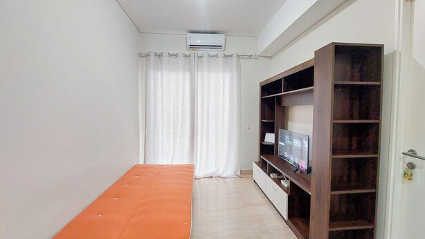 Deluxe Apartment | Living area - Comfort And Homey 2Br At Podomoro City Deli Medan Apartment (Medan)
