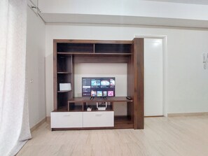 Deluxe Apartment | Living area - Comfort And Homey 2Br At Podomoro City Deli Medan Apartment (Medan)