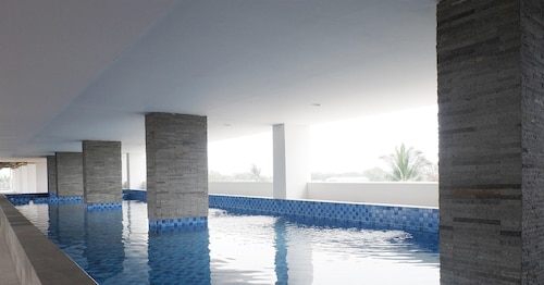 Homey And Cozy Living Studio At Poris 88 Apartment