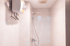 Deluxe Apartment | Bathroom | Shower, free toiletries, towels, soap - Comfy And Best Deal 2Br At Serpong Garden Apartment (Cisauk)