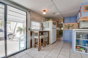 Fridge, microwave, coffee/tea maker, dining tables