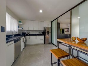 Fridge, microwave, oven, dishwasher - Marina Loft 307- Beautiful Renovated Studio 1 Bed (Playas del Coco)