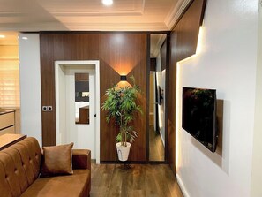 Family Apartment, Balcony, City View | Living area | Flat-screen TV - WHTYESCAPE SERVICED APARTMENTS (Abuja)