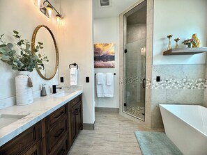 Jetted tub, hair dryer, towels, soap