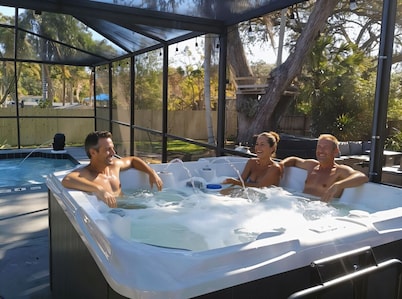 Sleeps 12  Caged Pool + Hot Tub, Pet-Friendly, 5 Min to Beach