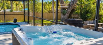 Sleeps 12 Caged Pool + Hot Tub, Pet-Friendly, 5 Min to Beach
