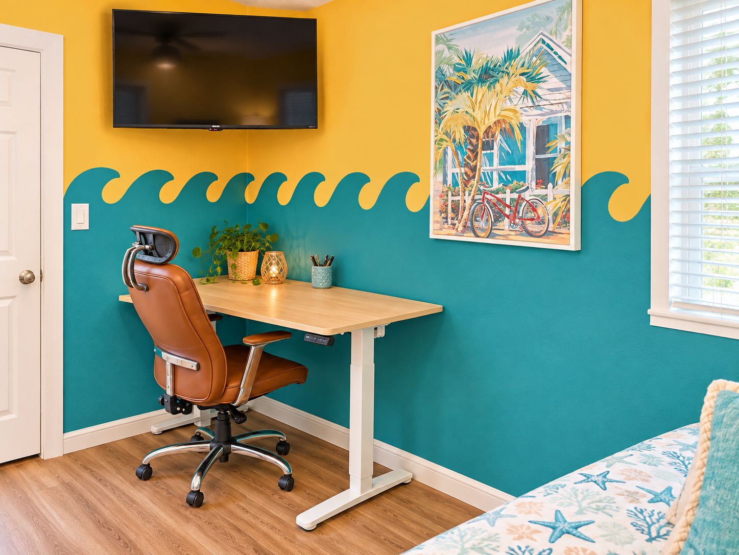 A room with a teal accent wall, a wooden desk, a brown office chair, a mounted TV, and a framed painting of a bicycle.