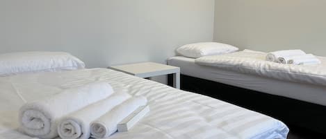 2 habitaciones, tabla de planchar con plancha, wifi y ropa de cama