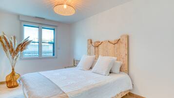 2 dormitorios, tabla de planchar con plancha, wifi gratis y ropa de cama